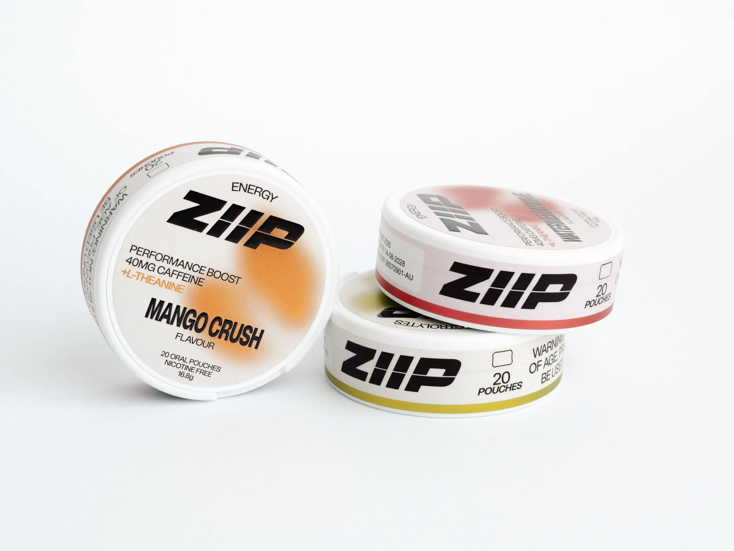 Three Ziip pouch tins: Mango Crush in front, Watermelon Wave and Citrus Burst behind